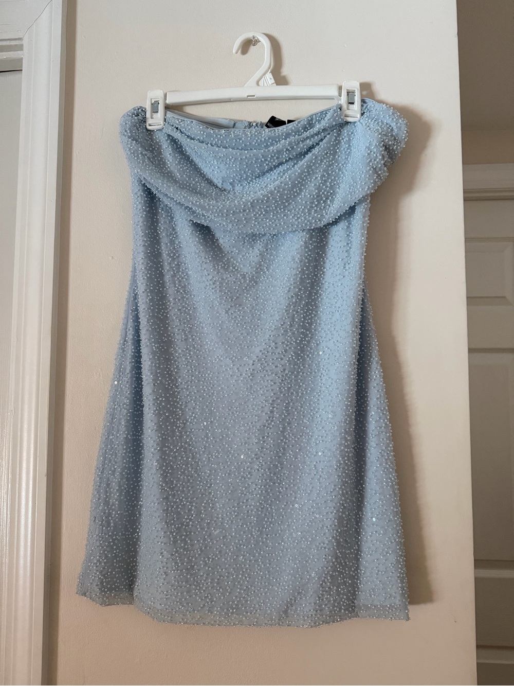Light blue mini dress, with pearl/bead details.